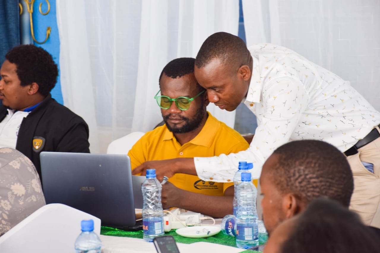 WinK Dev Solutions CEO Kennedy Ogolla facilitating a cybersecurity awareness training session for NALFA CBO members in Nairobi, Kenya